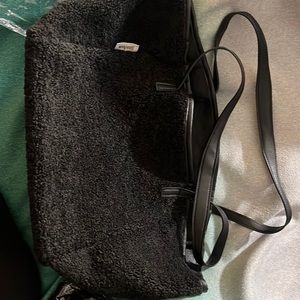 Black soft fabric Neiman Marcus tote and cosmetic bag